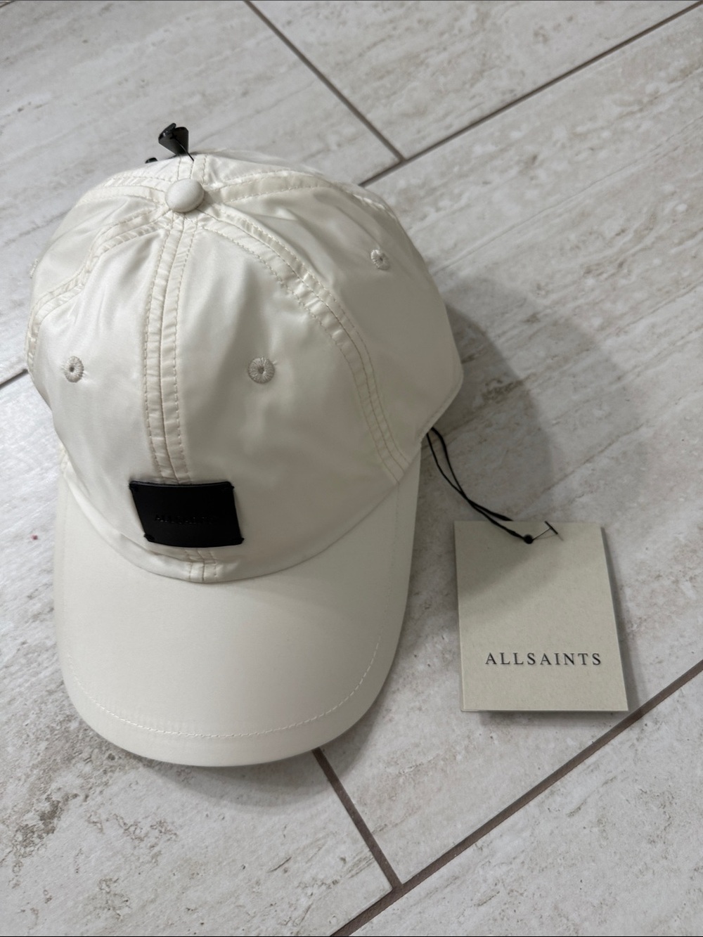 AllSaints chalk taffeta -black logo patch .. nwt
Authentic ..baseball cap o/s